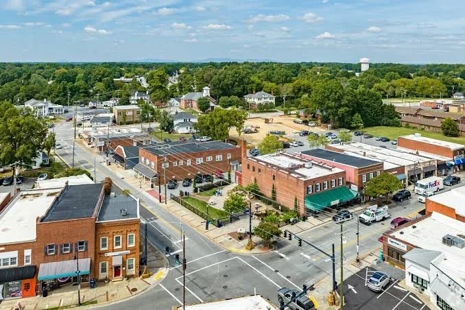 Aerial view of downtown Kernersville, NC streets and brick storefronts